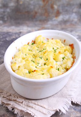 Cauliflower baked with cheese clipart