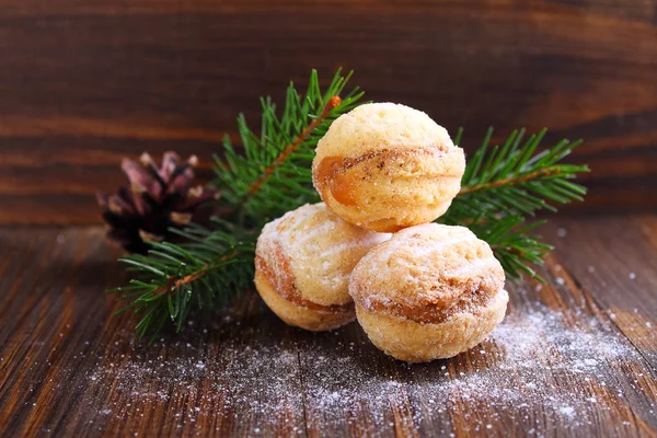 "Nuts" cookies with condensed milk on a dark background — Stock Photo, Image