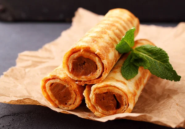 Wafer rolls with condensed milk — Stock Photo, Image
