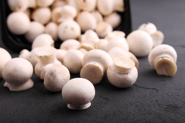 Raw white mushrooms