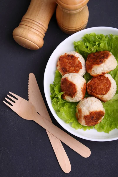 Chicken Cutlets Lettuce White Plate Black Background — Stock Photo, Image