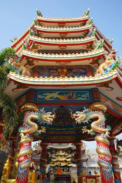 Chinese temple with dragons and drawing decoration. Low angle shot.