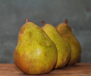 Three ripe pears cuttings up.jpg