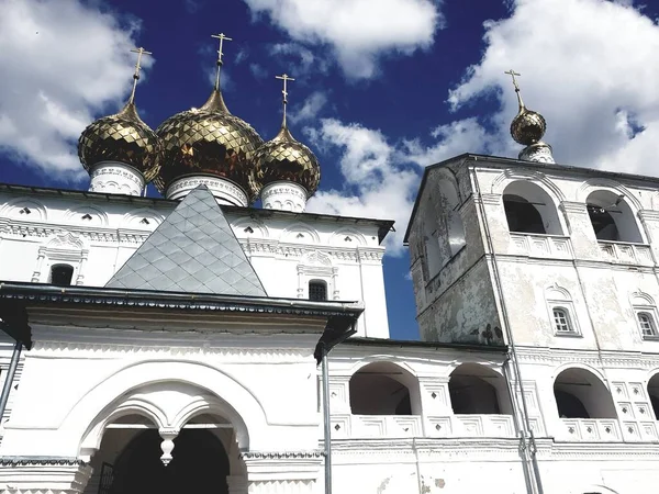 Belfry, golden domes, blue sky, Golden Ring of Russia