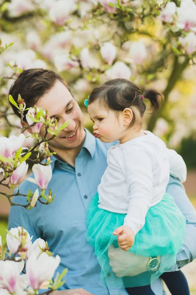 Todler girl in park with father — Stock Photo, Image