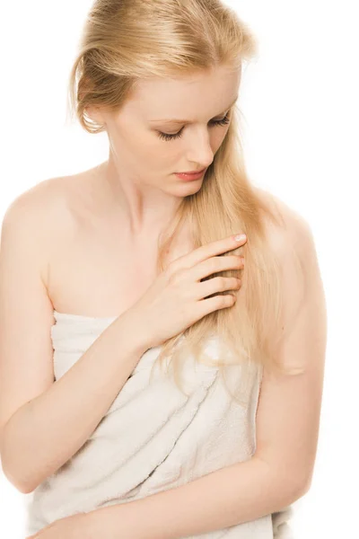 Beautiful young woman with clear skin in white towel isolated — Stock Photo, Image