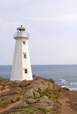 Vertical of the lighthouse at Cape Spear in Newfoundland clipart