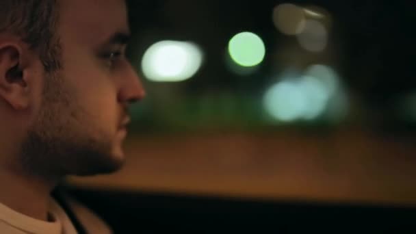 Close Portrait Young Brutal Man Car Driving Car Backdrop Blurred — Stock Video