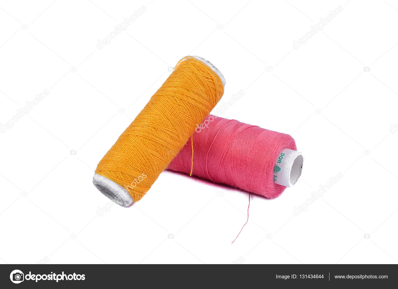 Sewing thread and needle on white — Stock Photo © ryabuha_nazar 131434644