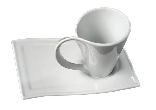 Bílý šálek a talířek izolovaných na bílém pozadí — Stock fotografie