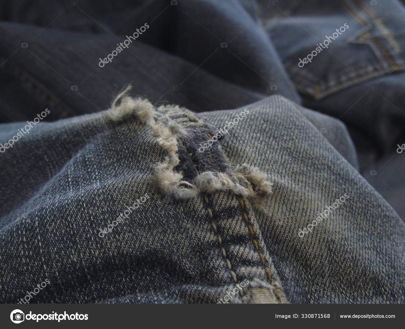 tattered blue jeans