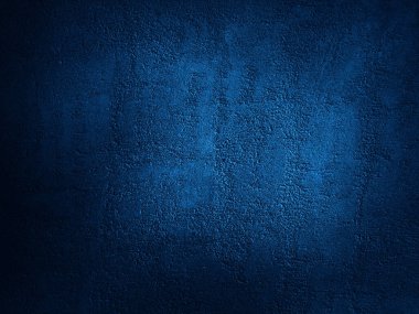    Abstract blue background. Dark blue grunge background. Rough grainy concrete wall surface texture. Deep blue concrete backdrop.                            