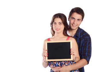 Genç çift holding kara tahta.