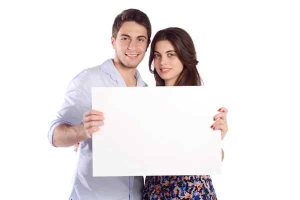 Casal segurando papelão branco . — Fotografia de Stock