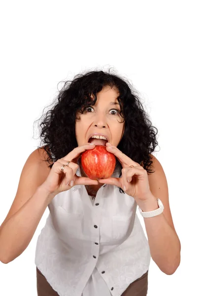 Woman eating an apple. — Stock Photo, Image