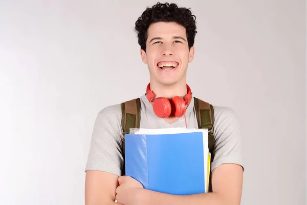 Retrato de jovem estudante segurando caderno . — Fotografia de Stock
