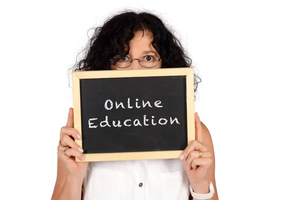 School teacher holding chalkboard with "online education" text. — Stock Photo, Image