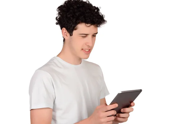 Porträt eines jungen Mannes mit Tablet. — Stockfoto