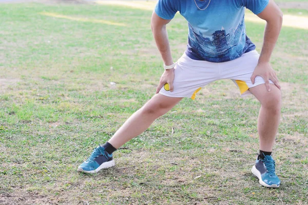 Man doing exercises at park. — Stock Photo, Image