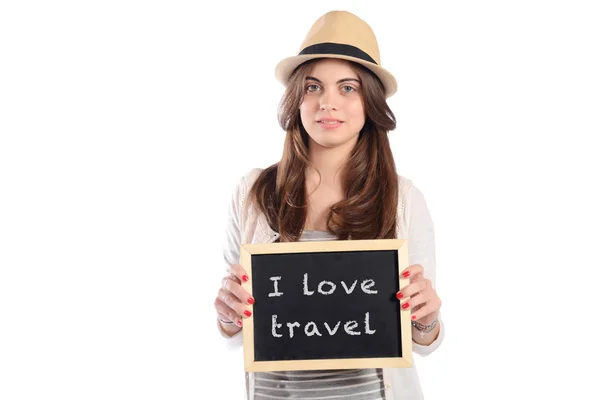 Mulher segurando quadro com "Eu amo viajar ". — Fotografia de Stock