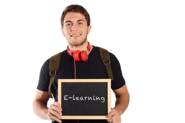 Man met schoolbord met "e-learning". — Stockfoto