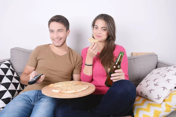 Stock image Couple eating and watch tv.