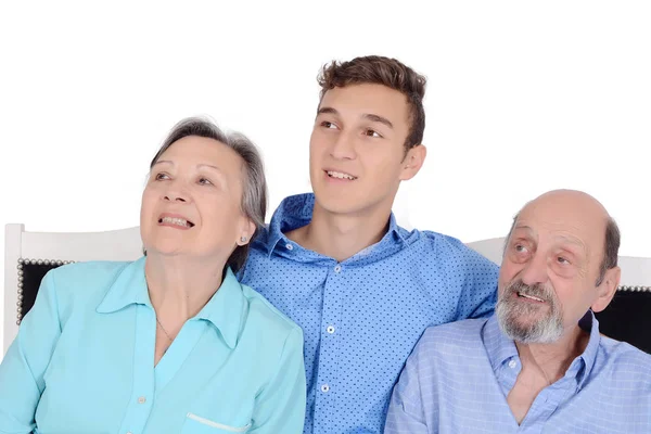 Retrato del nieto sonriente con sus abuelos — Foto de Stock