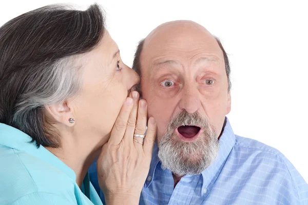 Retrato de pareja de ancianos susurrando —  Fotos de Stock