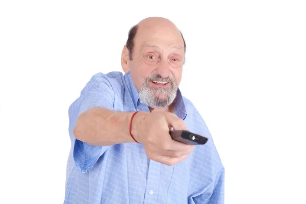 Homme âgé regardant la télévision avec télécommande — Photo