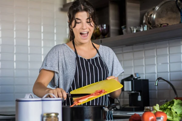 Cooking woman in kitchen