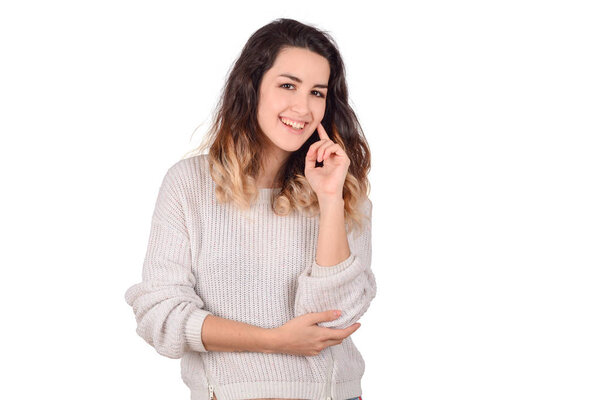 Portrait of young latin woman in a studio.