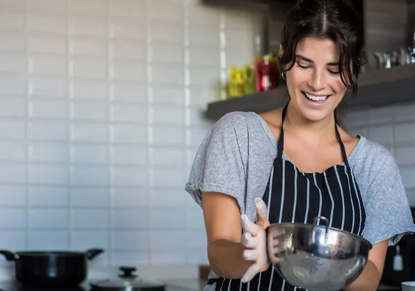 Cooking woman in kitchen