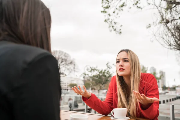 Portrait Two Angry Friends Having Serious Conversation Discussing While Sitting — Stock Photo, Image