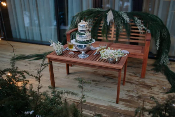 wedding cake on setting table