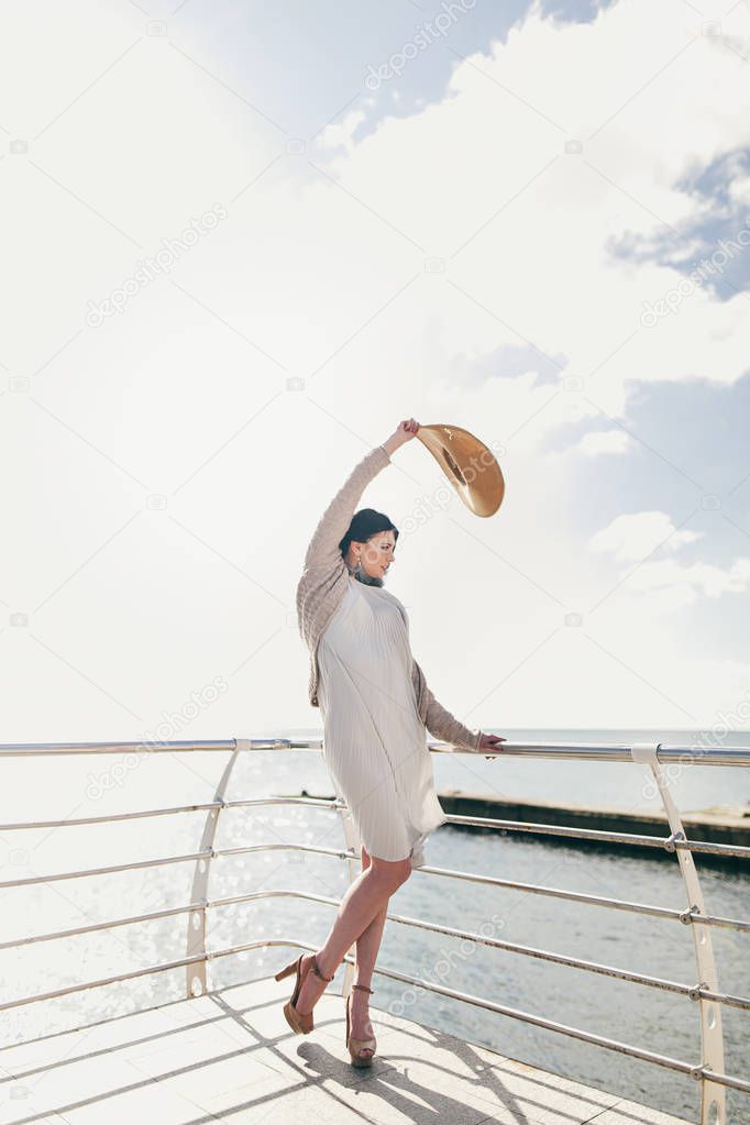 beautiful girl on pier 