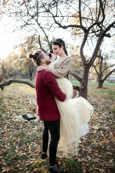 Bride couple at autumn park — Stock Photo, Image