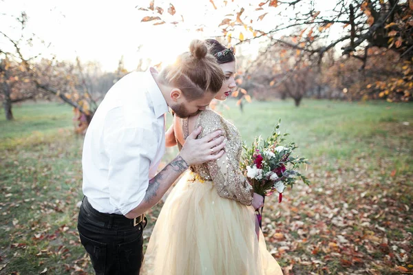 Bride couple at autumn park — Stock Photo, Image