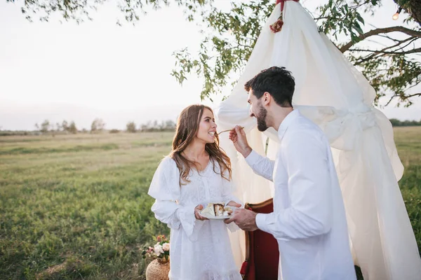 couple with wedding cake