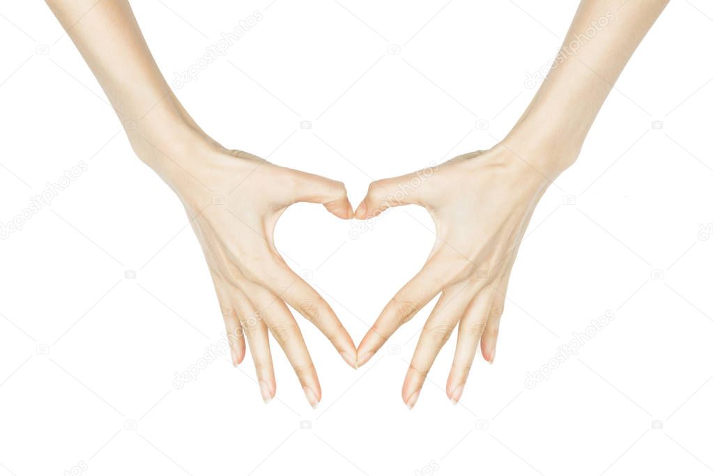 Female hands making Heart