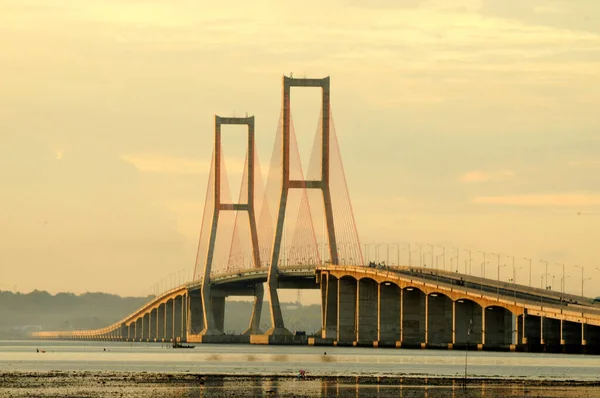 The Suramadu Bridge at Twilight with colorful lighting in Surabaya,Indonesia.Is the longest Bridge in Indonesia.