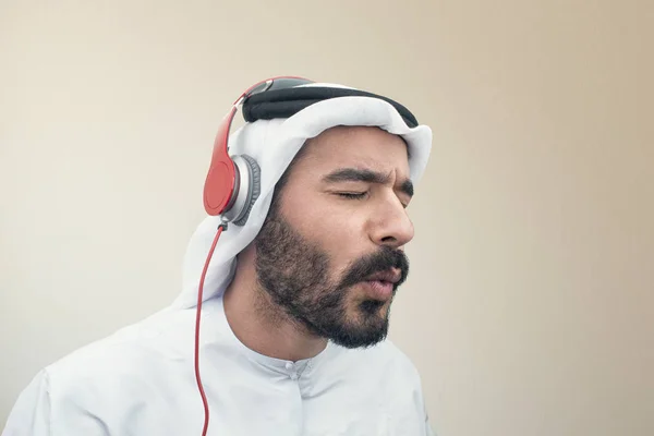 Arabian man in headphones