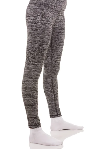 View of fit woman legs wearing in grey sports thermal patterned — Stock Photo, Image