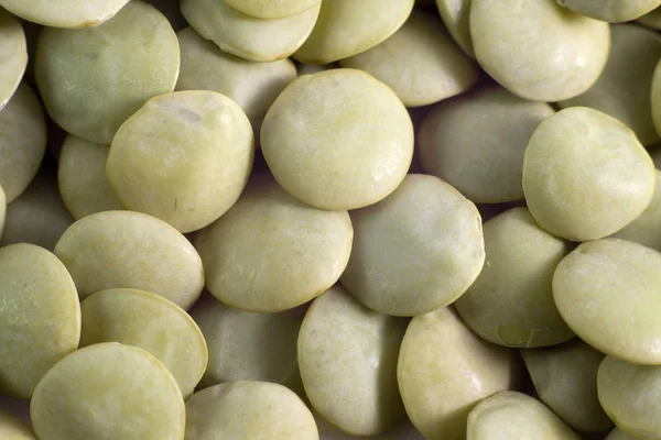 未煮熟的绿扁豆颗粒质感 图库图片