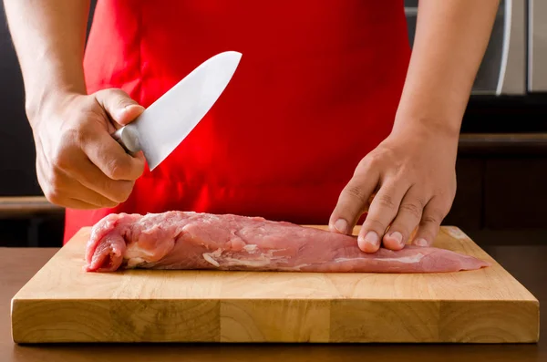Chopping raw pork — Stock Photo, Image