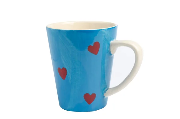 Taza de café de cerámica azul con corazón rojo aislado sobre fondo blanco —  Fotos de Stock