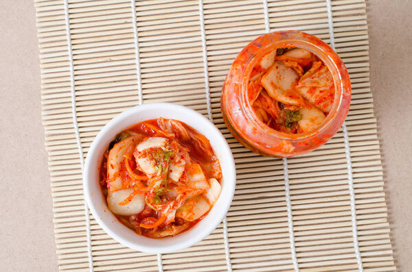 Korean food,kimchi cabbage in a bowl and jar