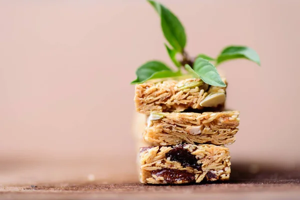 Stack of snack bar or energy bar on wooden background