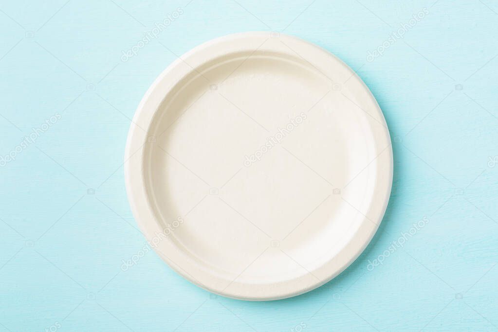 Biodegradable plate, Compostable plate or Eco friendly disposable plate on pastel color background, top view