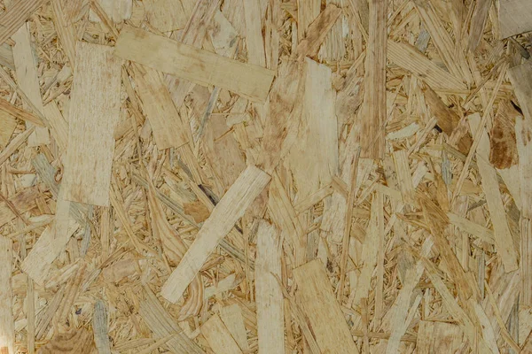 Абстрактна фонова текстура тріски деревини фетру коричневого кольору (OSB ) — стокове фото