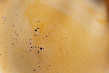 Köpük krema kahve deseni makro arka plan sıcak kahve, yakın çekim üst görünüm